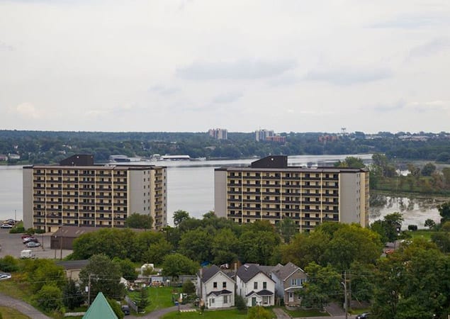 View of 47 & 67 Village Drive in Kingston, Ontario from a distance