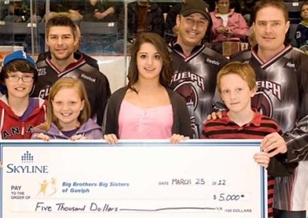 Presenting Big Brothers Big Sisters of Guelph with a donation of $5,000