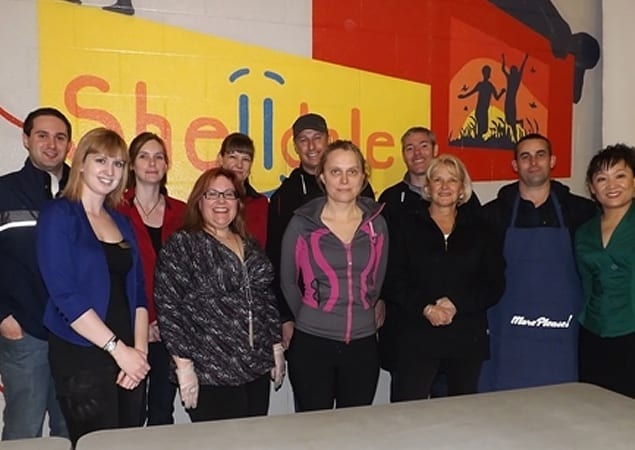 Skyline staff serving a barbecue dinner to the dedicated volunteers of Onward Willow.