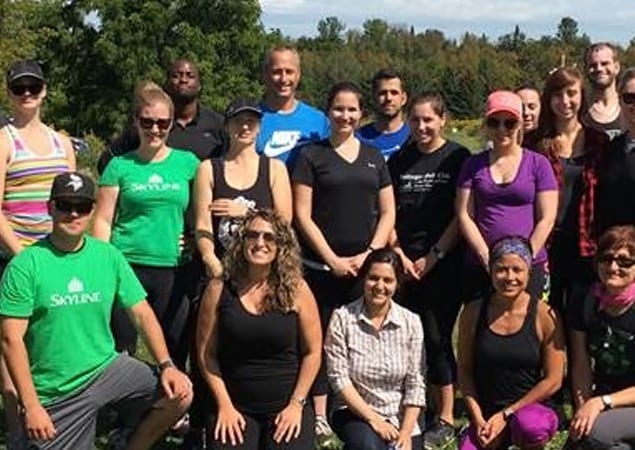 A group of 20 Skyline employees participate in setting up the Mud Run