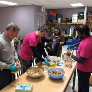 Five Skyliners prepare snacks for elementary school classes