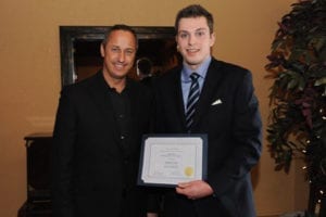 Roy Jason Ashdown presents the 2012 Skyline Real Estate Scholarship to Joshua Cronk.