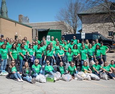 Skyline employees in bright green shirts celebrate Earth Day 2022