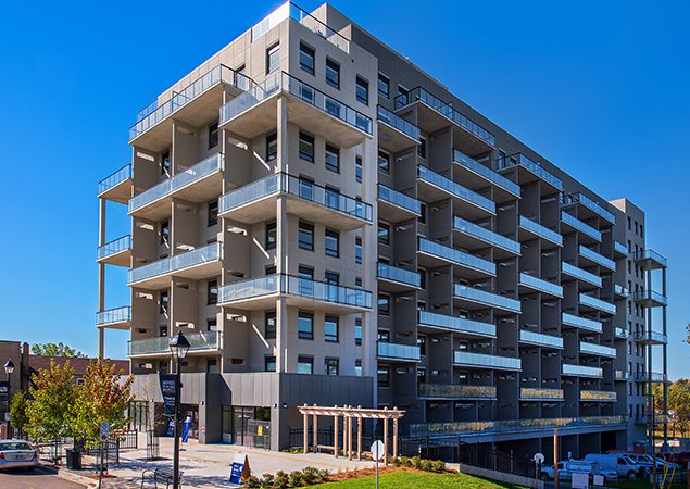 Exterior of an apartment property at 49 Queen Street East in Cambridge, Ontario.