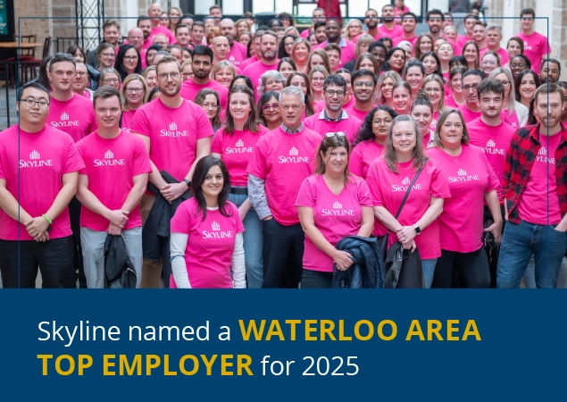 A large group of people wearing pink t-shirts